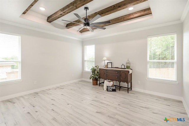 office with wood finished floors, a raised ceiling, a ceiling fan, and baseboards