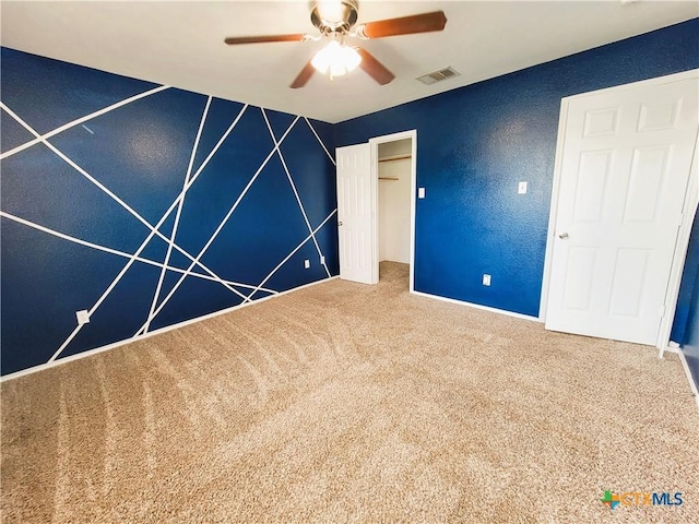 9200 Ashlyn Dr, Killeen, TX 76542 - unfurnished bedroom featuring carpet floors, a closet, a ceiling fan, and a textured wall