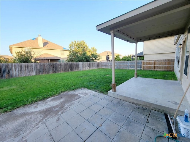9200 Ashlyn Dr, Killeen, TX 76542 - fenced backyard with a patio