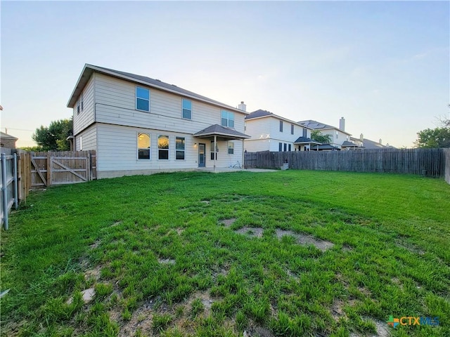 9200 Ashlyn Dr, Killeen, TX 76542 - back of house with a fenced backyard