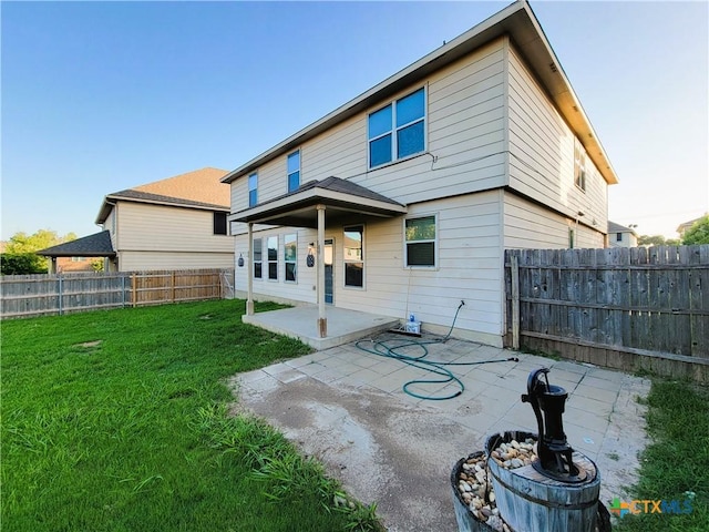 9200 Ashlyn Dr, Killeen, TX 76542 - rear view of property featuring a patio and a fenced backyard