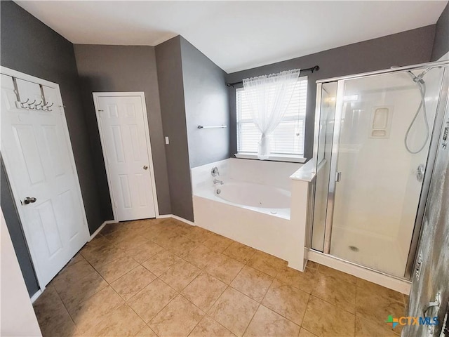 9200 Ashlyn Dr, Killeen, TX 76542 - full bathroom with a bath, a stall shower, and tile patterned flooring