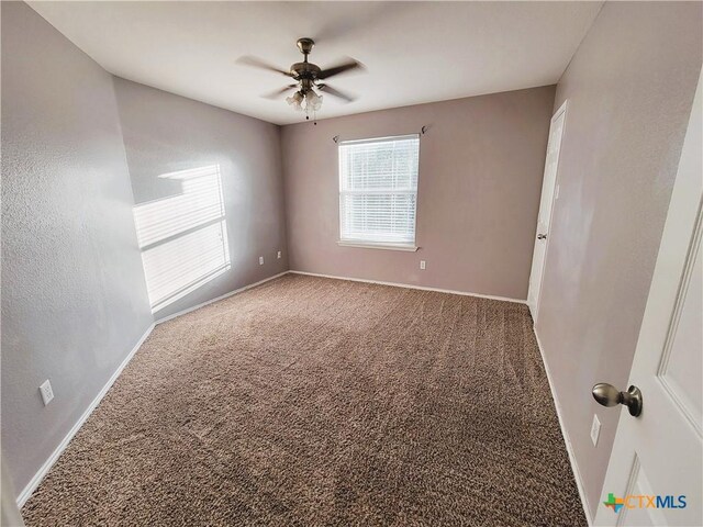 9200 Ashlyn Dr, Killeen, TX 76542 - carpeted empty room with baseboards and ceiling fan