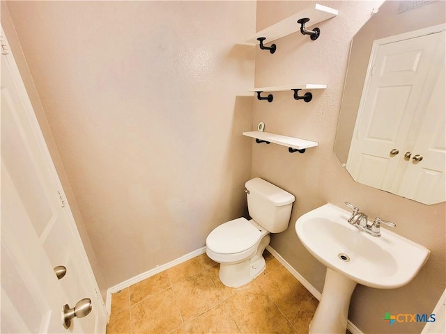 9200 Ashlyn Dr, Killeen, TX 76542 - bathroom featuring toilet and tile patterned floors