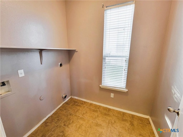 9200 Ashlyn Dr, Killeen, TX 76542 - washroom featuring hookup for a gas dryer, washer hookup, electric dryer hookup, and light tile patterned flooring