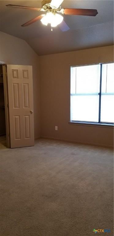 1207 Nicholas Cir, Killeen, TX 76542 - empty room featuring lofted ceiling, light colored carpet, and a ceiling fan