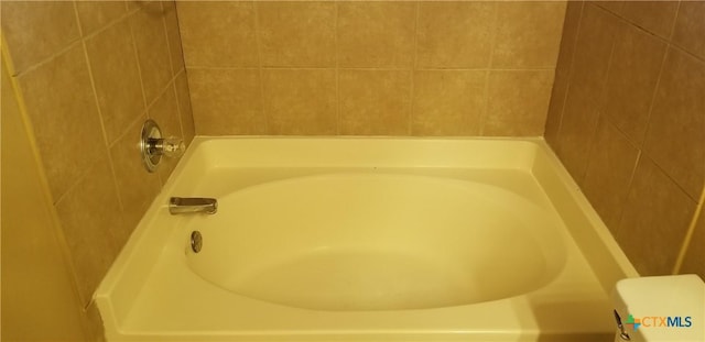 1207 Nicholas Cir, Killeen, TX 76542 - bathroom featuring a tub and toilet