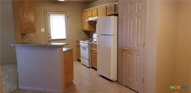 1207 Nicholas Cir, Killeen, TX 76542 - kitchen with white appliances, under cabinet range hood, light tile patterned floors, and a peninsula