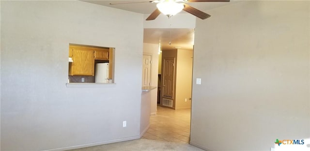 1207 Nicholas Cir, Killeen, TX 76542 - spare room with ceiling fan, light tile patterned floors, and baseboards