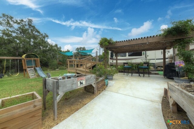 exterior space featuring a patio area, a lawn, and a pergola