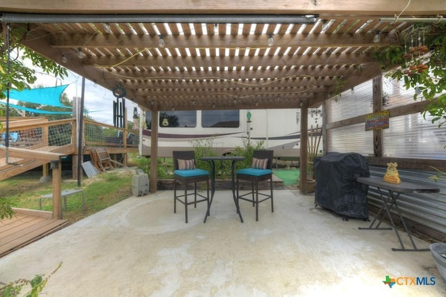 861 Rutherford, Fischer, TX 78623 - view of patio featuring grilling area and a pergola