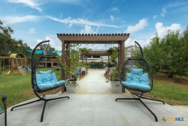 view of patio featuring a playground and a pergola