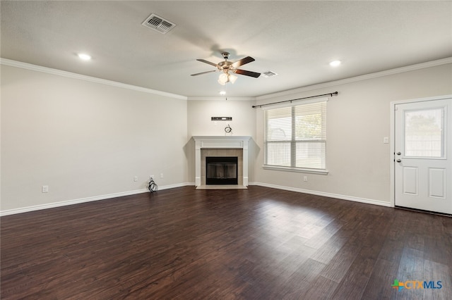 unfurnished living room with ornamental molding, ceiling fan, dark hardwood / wood-style floors, and a fireplace