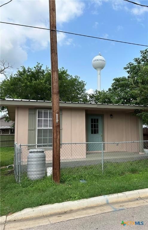 view of side of property with fence