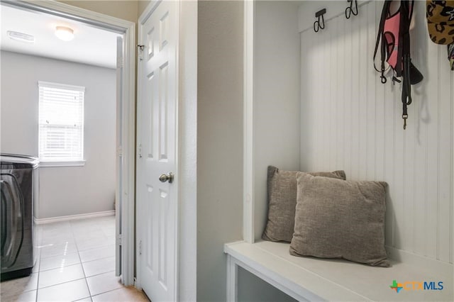 mudroom with light tile patterned flooring