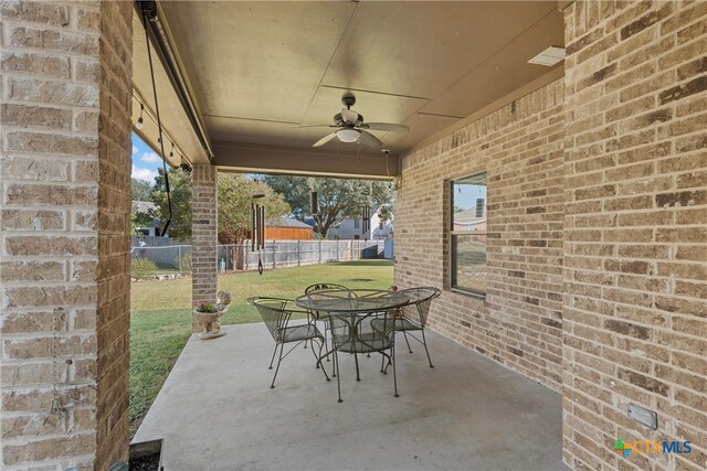 view of patio with ceiling fan