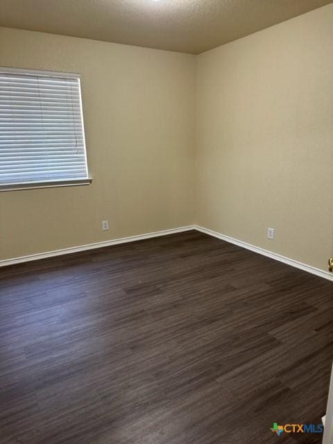 221 Roadrunner Ave, New Braunfels, TX 78130 - spare room with dark wood finished floors