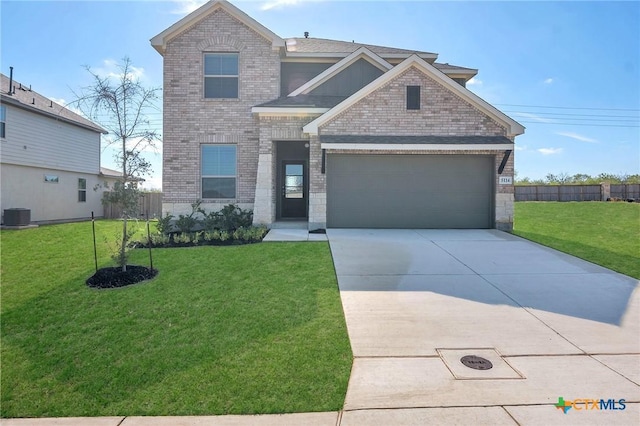 view of front of home with a front yard and central AC unit