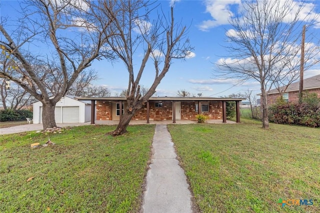 ranch-style house with a garage and a front yard