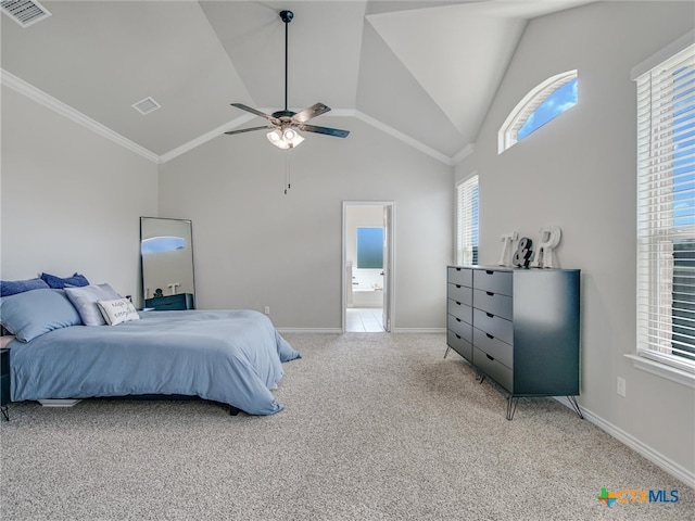 bedroom with carpet, multiple windows, ceiling fan, and vaulted ceiling