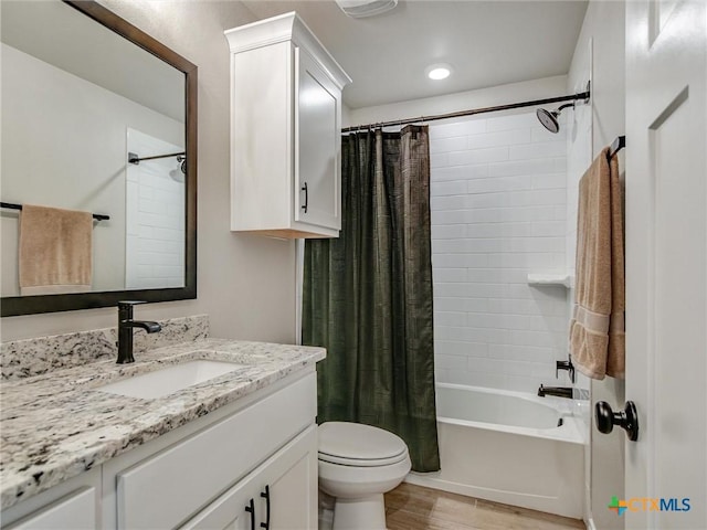 1701 Meadow Crest Dr, Salado, TX 76571 - bathroom with shower / bathtub combination with curtain, toilet, vanity, wood finished floors, and recessed lighting