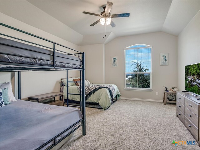 bedroom featuring lofted ceiling, light carpet, and ceiling fan