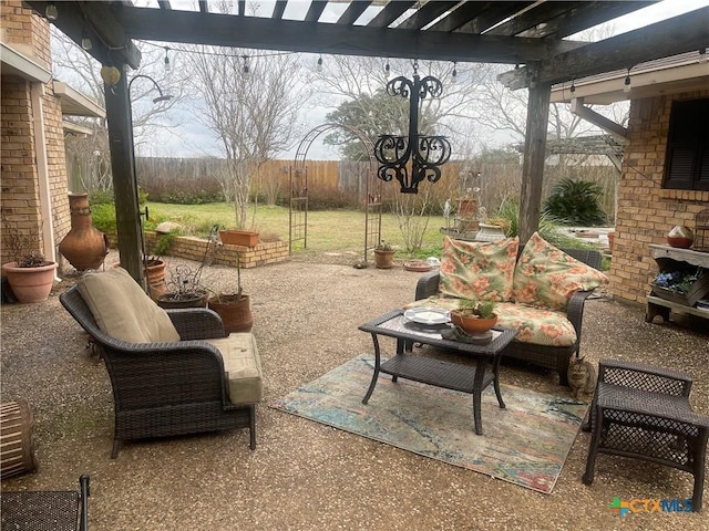 view of patio / terrace featuring a pergola and an outdoor hangout area