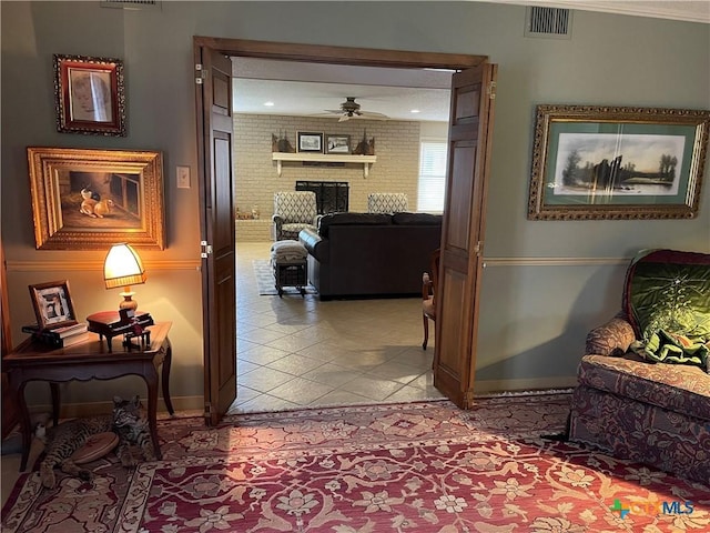 hall with light tile patterned flooring