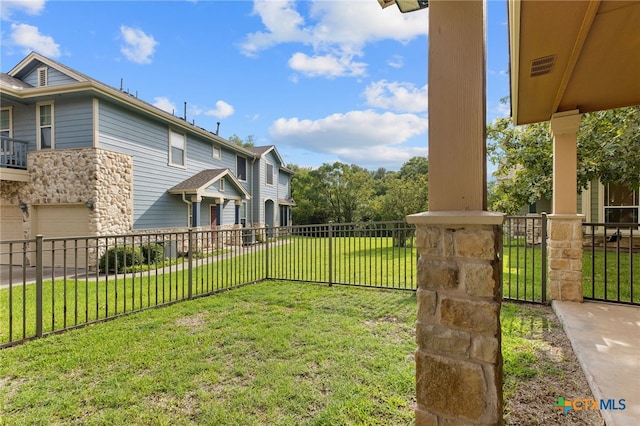 view of yard with a garage