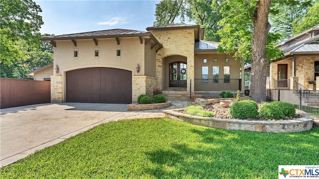 mediterranean / spanish-style home with a front yard