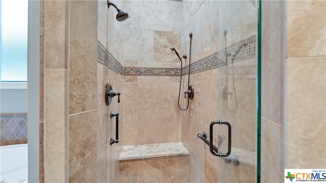 bathroom featuring walk in shower