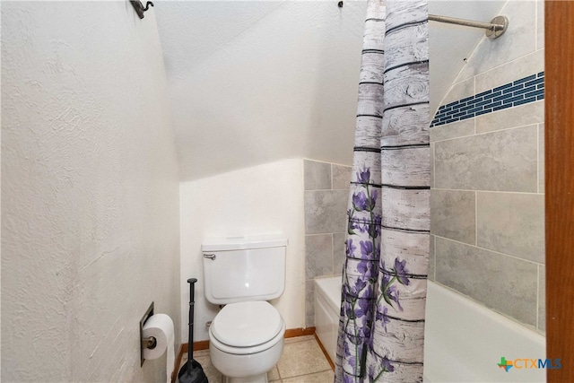 bathroom with toilet, shower / bath combo, and tile patterned floors