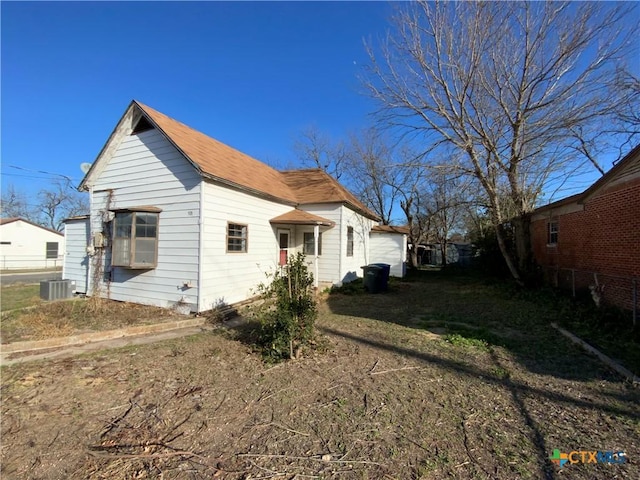 exterior space featuring central AC unit