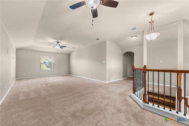 5705 Fenton Ln, Belton, TX 76513 - spare room featuring ceiling fan, arched walkways, light colored carpet, and baseboards