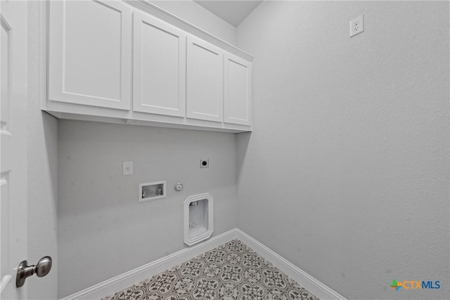 laundry area featuring tile patterned flooring, cabinets, hookup for a gas dryer, electric dryer hookup, and washer hookup