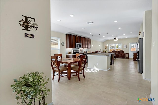 dining space with visible vents, a ceiling fan, and recessed lighting