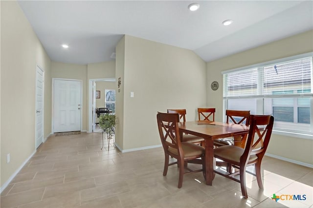 dining area featuring vaulted ceiling, light tile patterned floors, recessed lighting, and baseboards