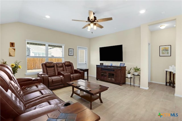 living area featuring lofted ceiling, ceiling fan, baseboards, and recessed lighting