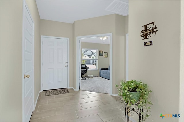 interior space with visible vents and baseboards