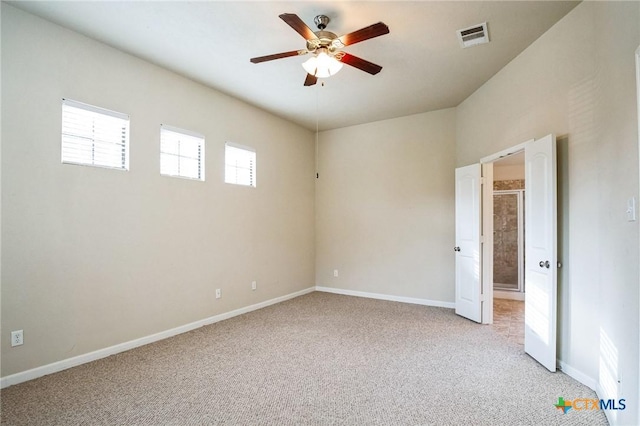 empty room with light carpet and ceiling fan