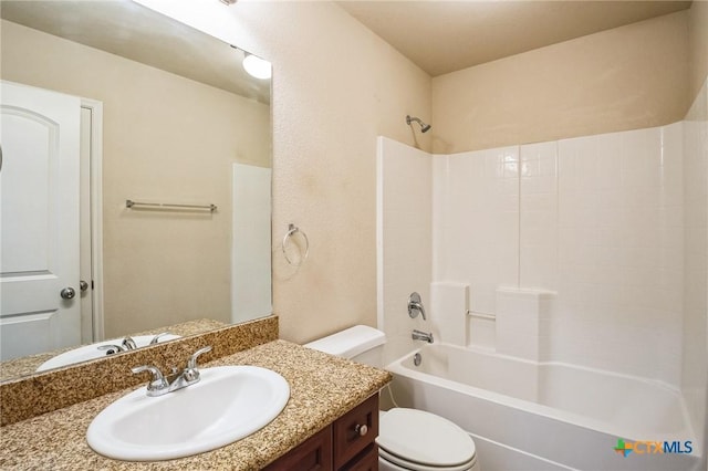 full bathroom featuring shower / washtub combination, toilet, and vanity