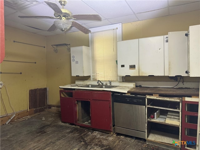 kitchen featuring sink, a drop ceiling, ceiling fan, dark hardwood / wood-style floors, and dishwasher