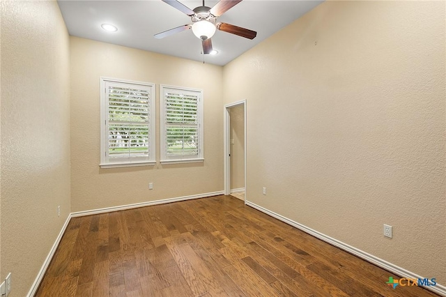 unfurnished room featuring ceiling fan and wood-type flooring