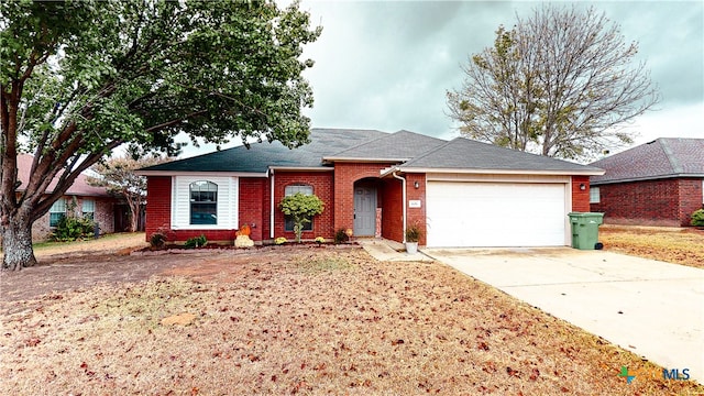 single story home featuring a garage