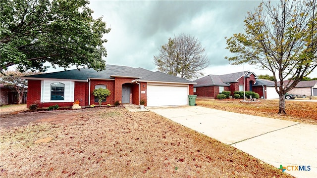 single story home with a garage