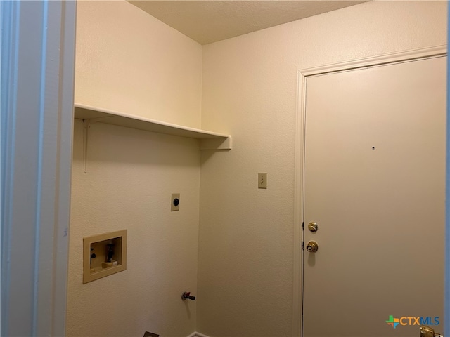 laundry room featuring washer hookup and electric dryer hookup