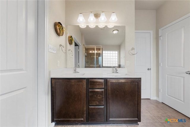 2014 Deer Field Way, Harker Heights, TX 76548 - bathroom with double vanity, a shower stall, and tile patterned floors