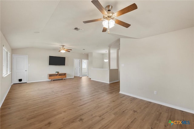 2014 Deer Field Way, Harker Heights, TX 76548 - unfurnished living room featuring ceiling fan, wood finished floors, and vaulted ceiling