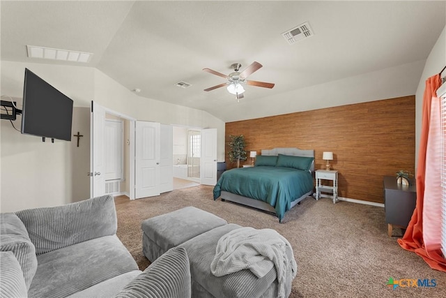 2014 Deer Field Way, Harker Heights, TX 76548 - bedroom featuring vaulted ceiling, carpet, wood walls, ceiling fan, and connected bathroom