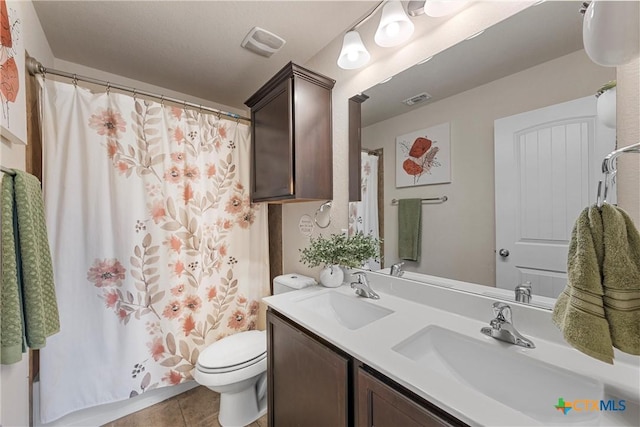 2014 Deer Field Way, Harker Heights, TX 76548 - bathroom featuring double vanity, tile patterned floors, and curtained shower
